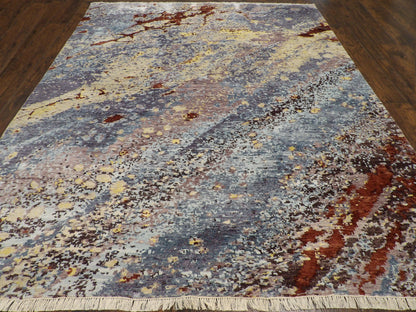 Close-up of carved wool-silk pile, blue and brown rug