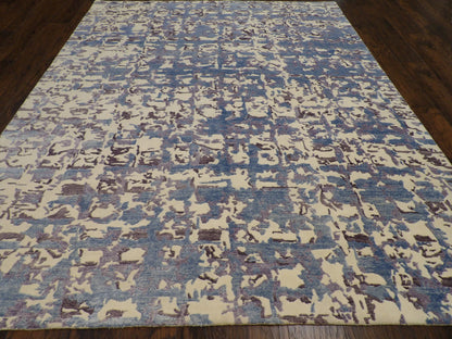 Carved abstract pattern detail, blue and white rug
