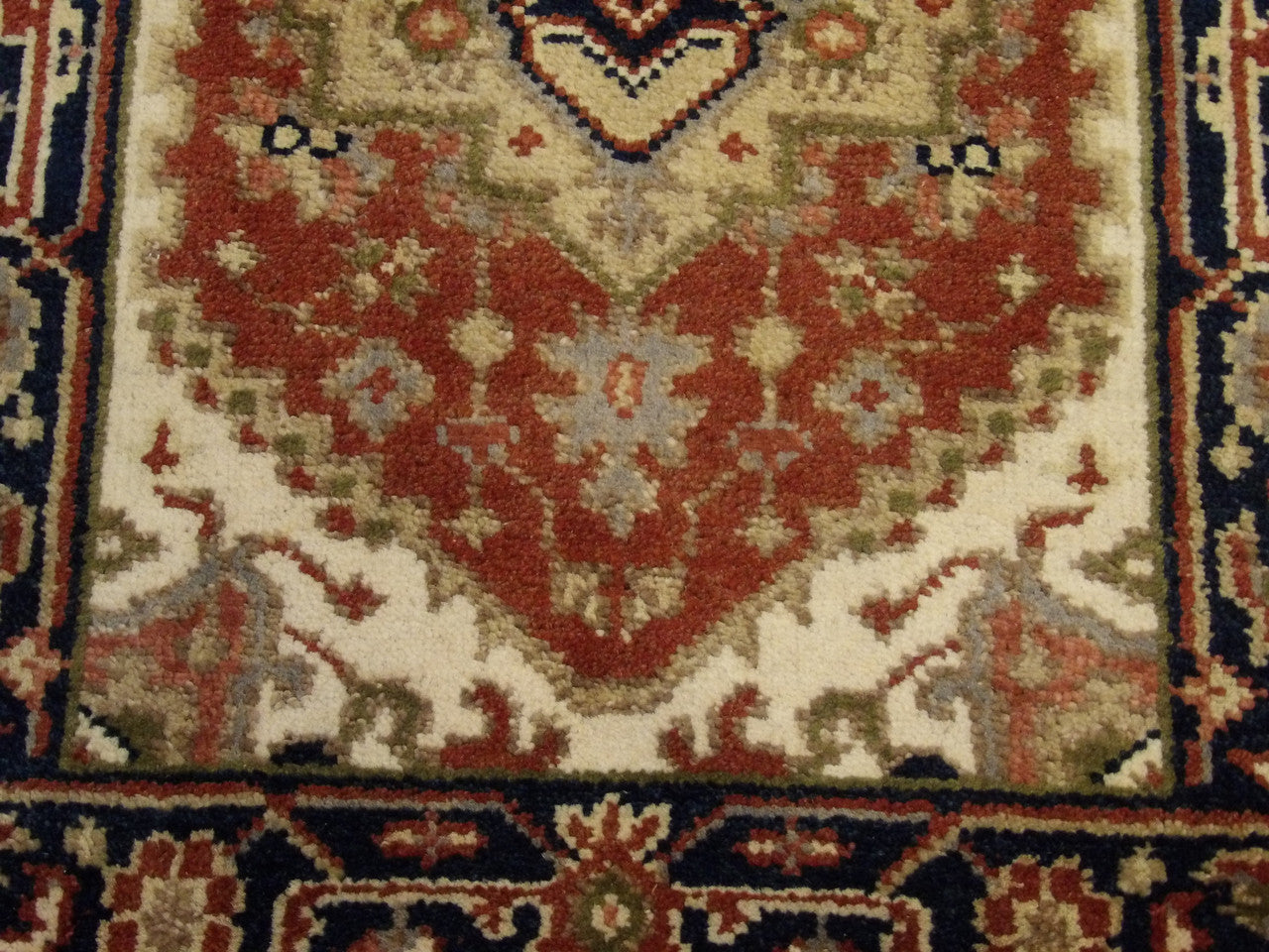 Tribal Heriz rug border detail