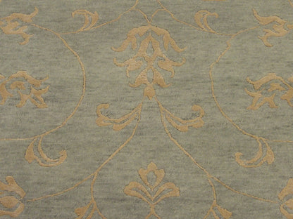 Transitional leaves rug border detail, blue and gold