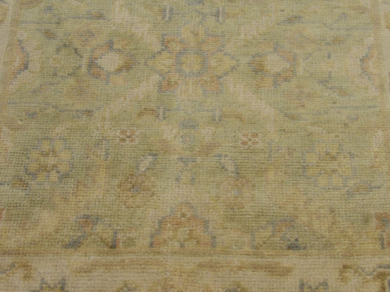 Oushak runner border detail, beige and green