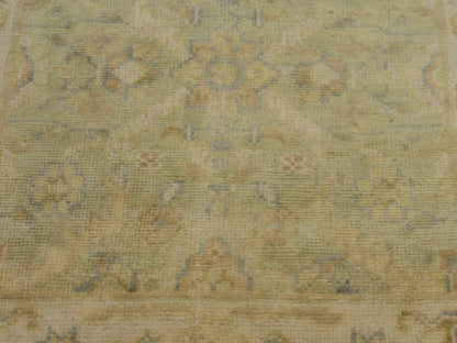 Oushak runner border detail, beige and green