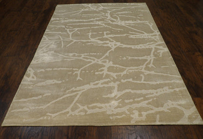 Close-up of looped wool-silk texture, green and gray rug