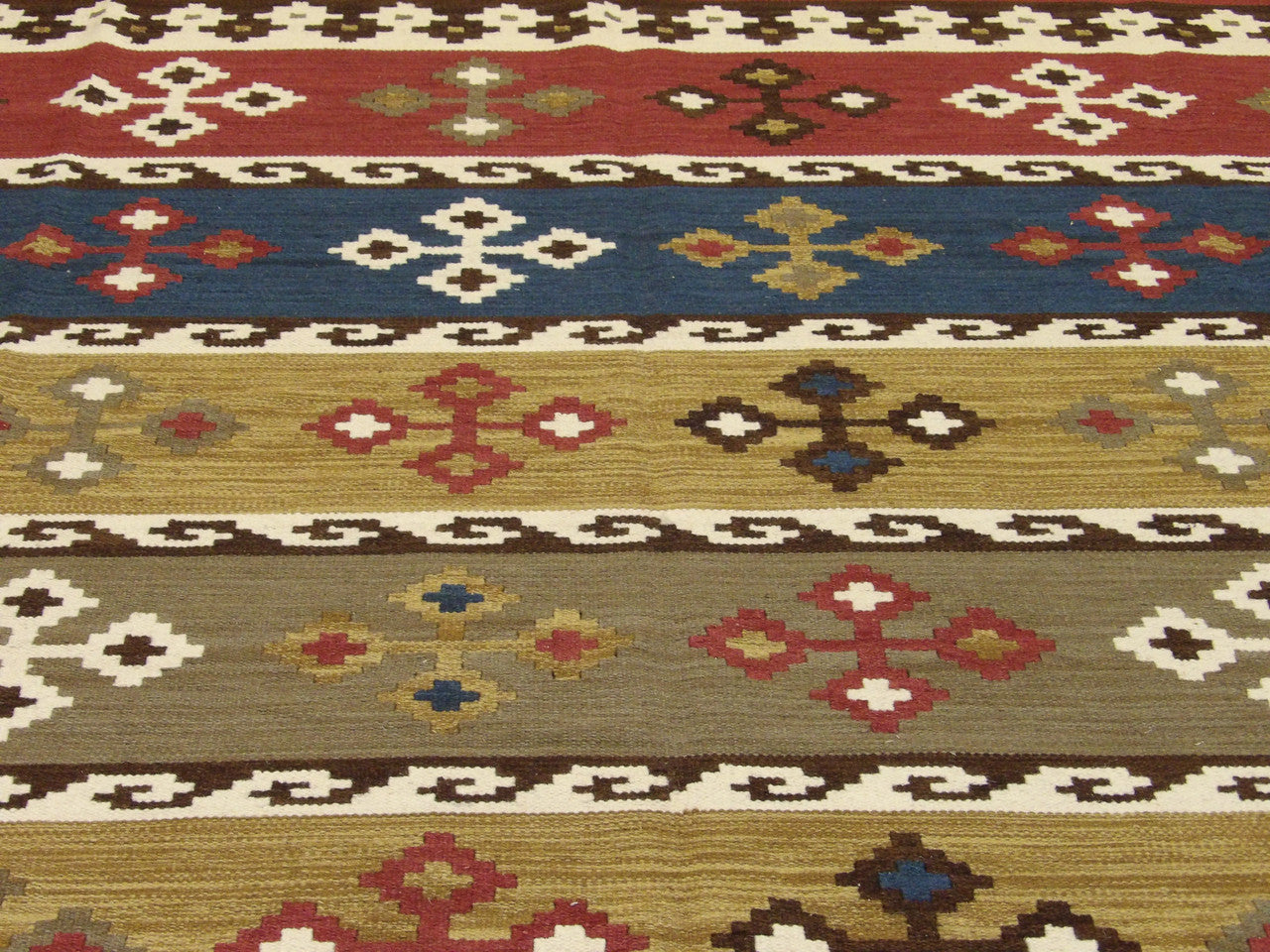 Coastal flatweave wool texture close-up, multi-color