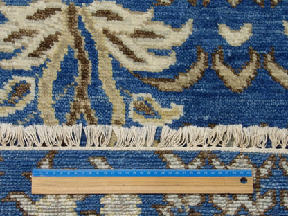 Full view of transitional flower hand-knotted runner