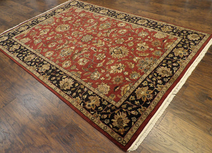 Black Kashan rug in a formal room setting