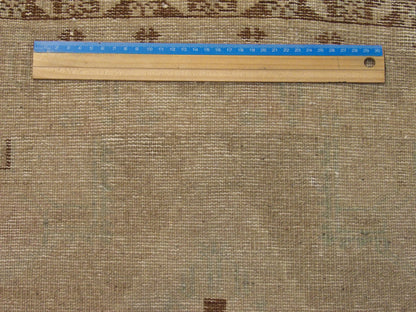 Brown & Beige Vintage Turk Anatolian Antique Yastik rug in room setting