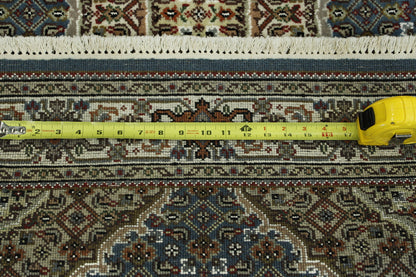 Blue & Beige Traditional Tabriz rug in room setting