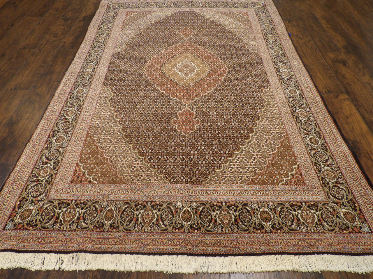 Close-up of fine knotting on Persian Mahi Tabriz rug