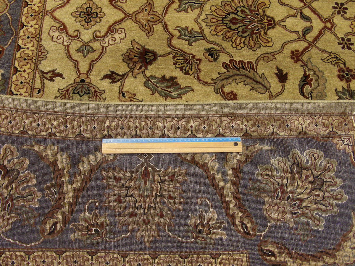 Blue and green Ziegler rug in room setting