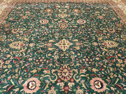 Wool texture close-up, green and beige Kashan rug