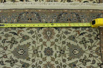 Beige Traditional Fine Herati rug in room setting