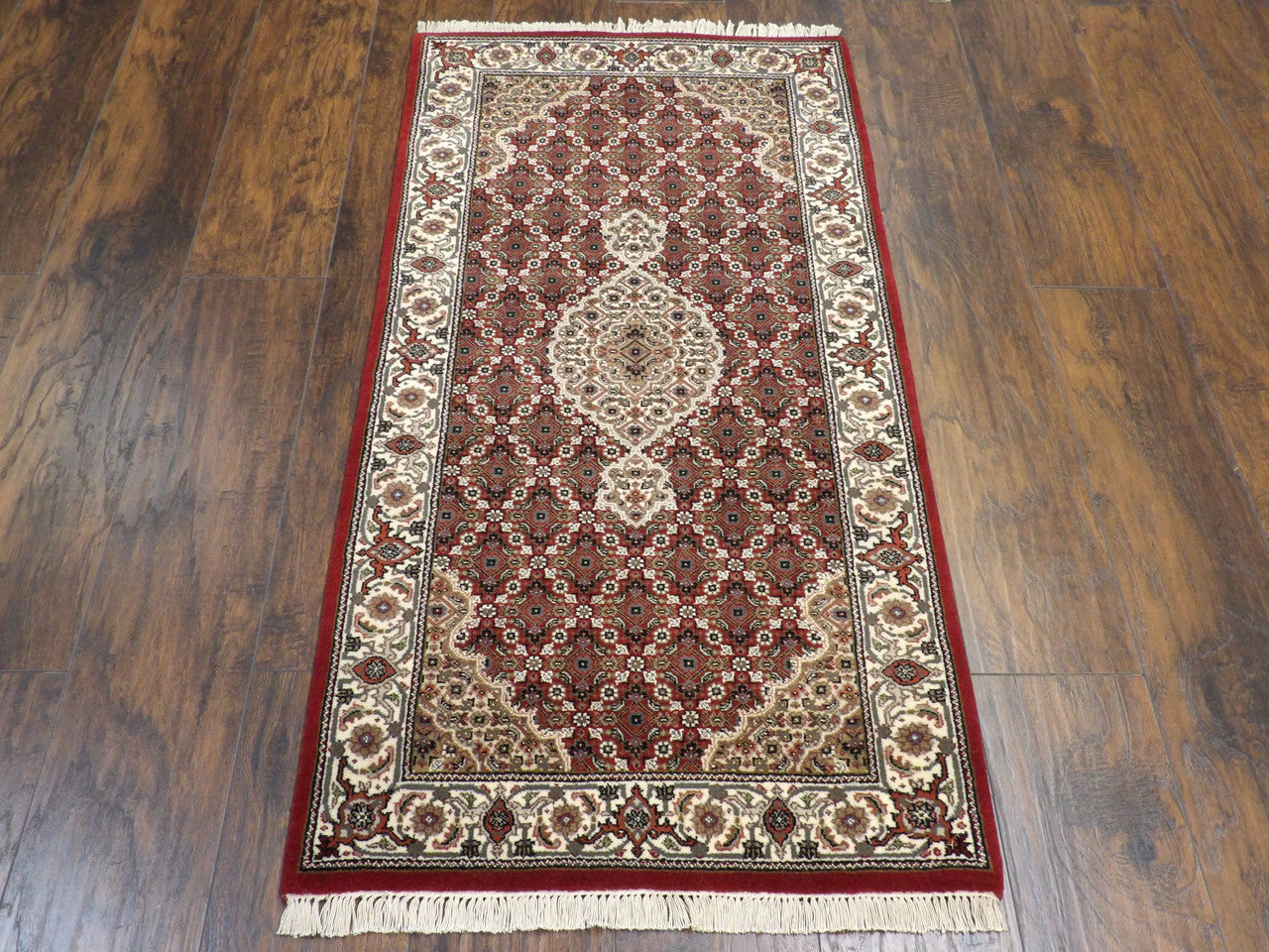Close-up of wool pile, Beige & Red rug