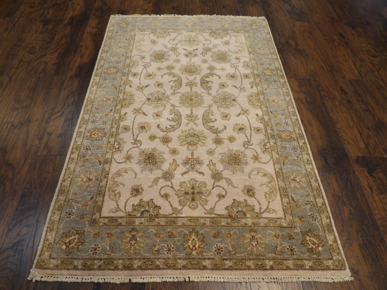 Close-up of wool pile, blue and ivory rug