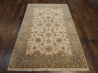 Close-up of wool pile, blue and ivory rug