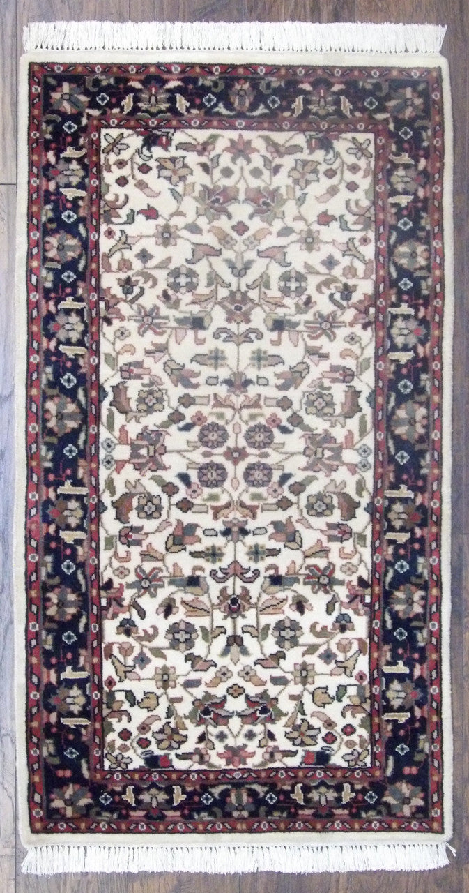 Fine Persian Kashan hand-knotted wool rug in blue and ivory, full view