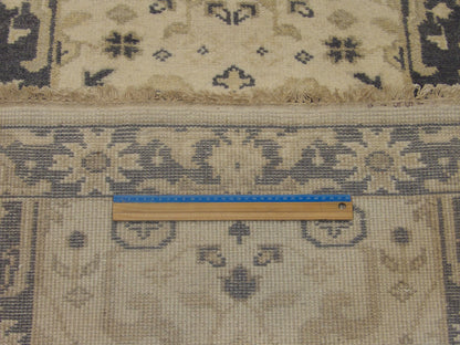Gray and ivory Oushak runner in hallway setting