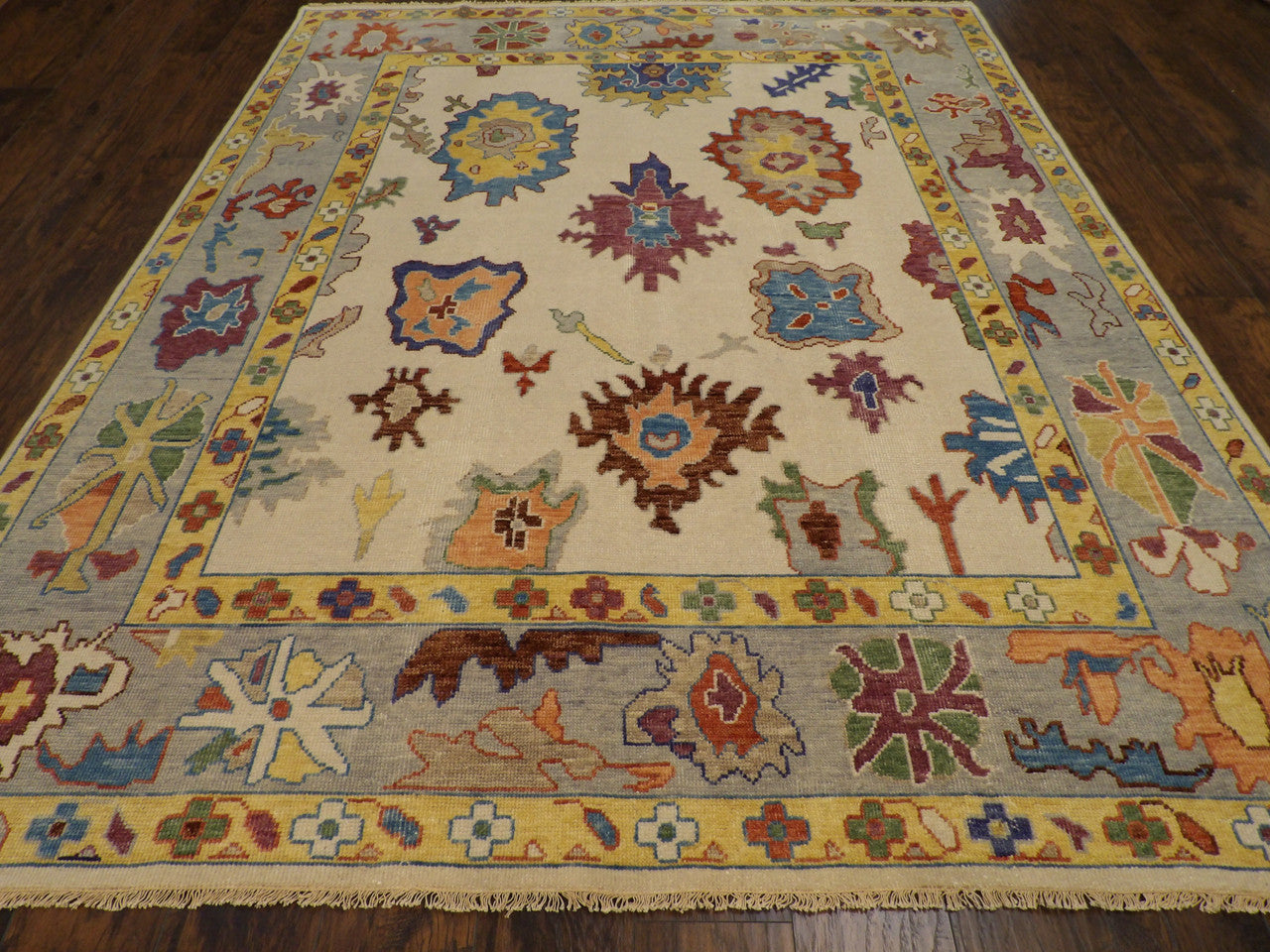 Close-up of wool pile on colorful Oushak rug