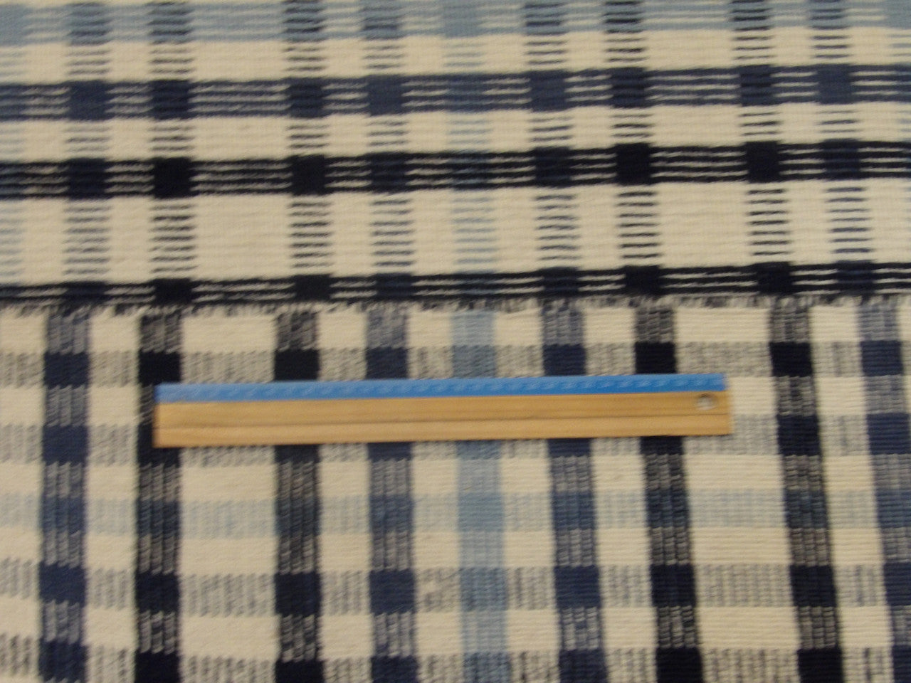Blue Coastal Flat Weave Indoor/Outdoor Beach rug in room setting