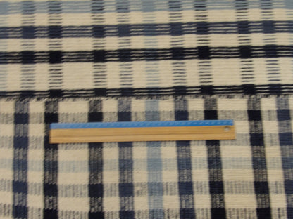 Blue Coastal Flat Weave Indoor/Outdoor Beach rug in room setting