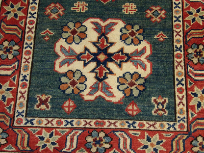 Tribal Kazak rug border detail