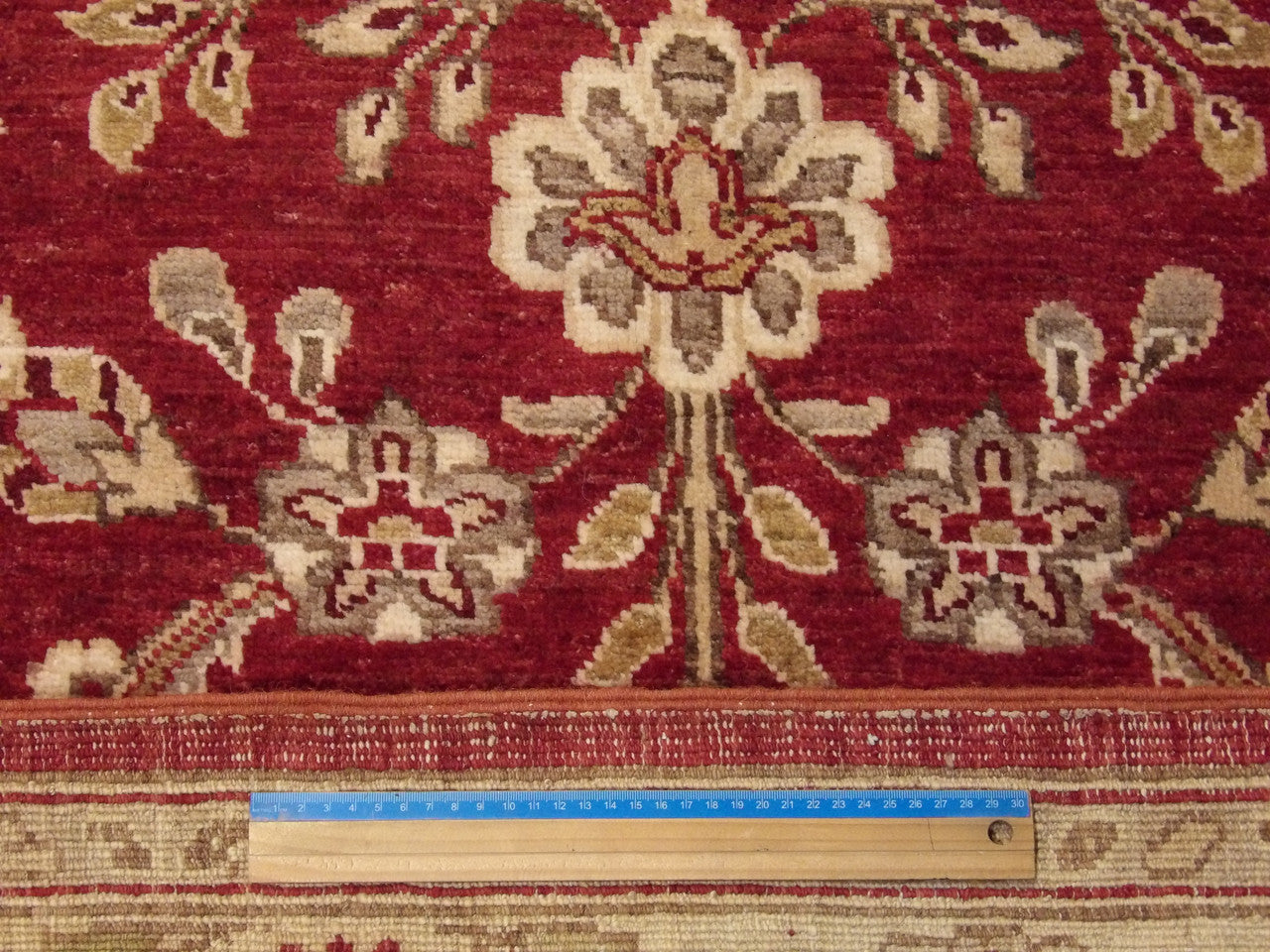 Gold & Red Chobi Oushak rug in room setting
