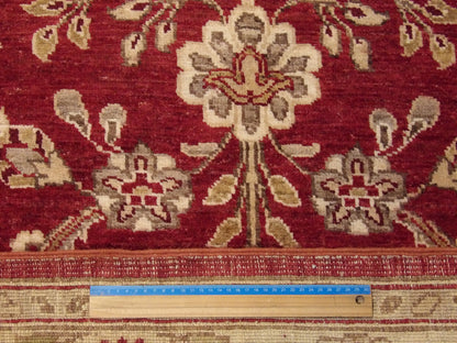 Gold & Red Chobi Oushak rug in room setting