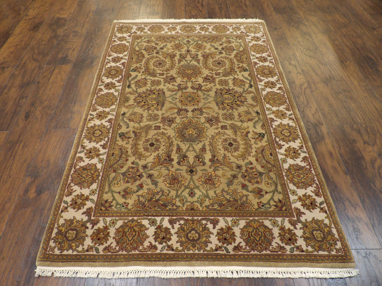 Back of hand-knotted Jaipur Kashan rug showing construction