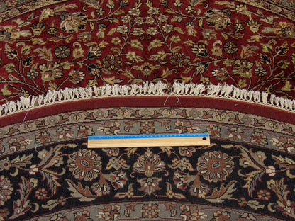 Black & Red Fine Persian Tabriz rug in room setting