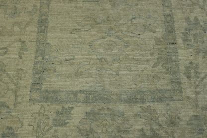 Beige & Pink Oushak Chobi rug in room setting
