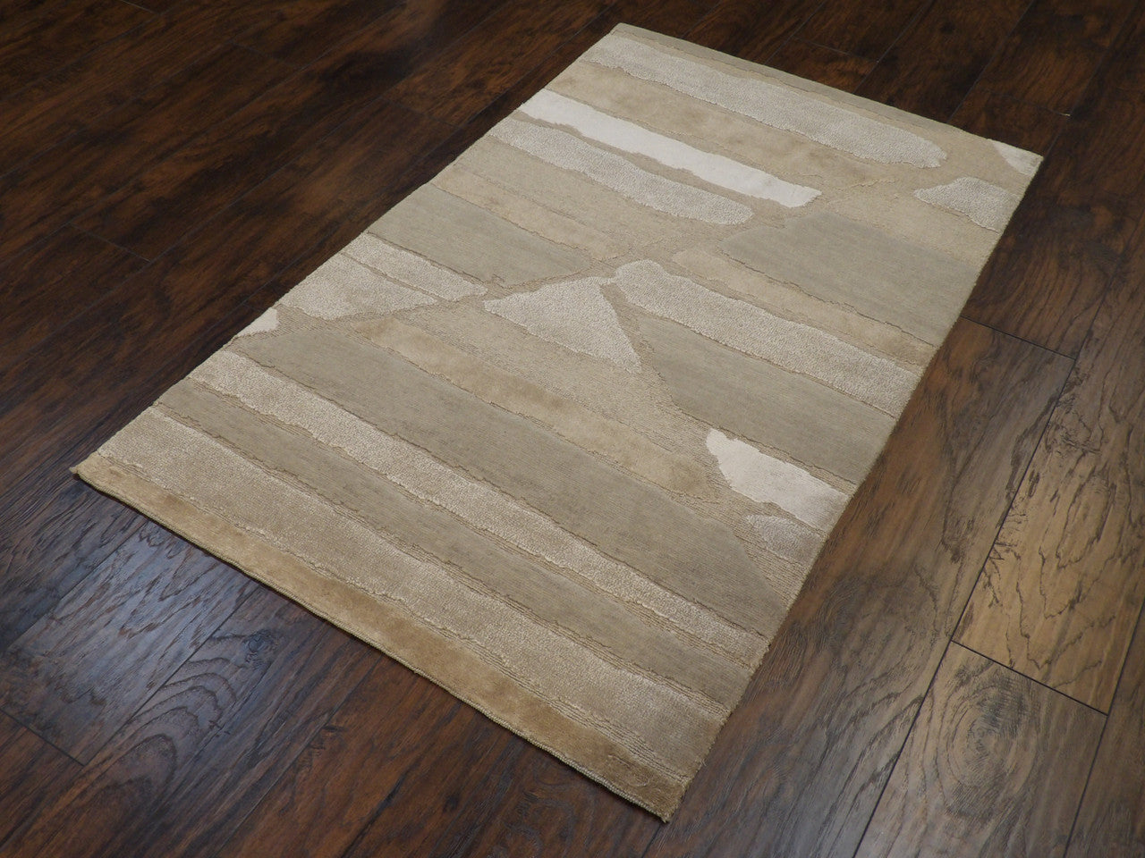 Abstract pattern detail, gray rug