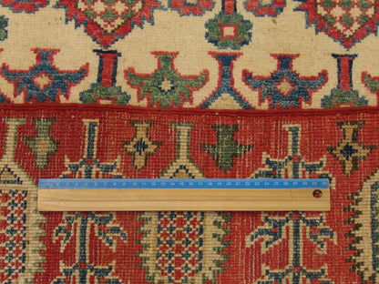 Beige & Red Tribal Super Kazak rug in room setting
