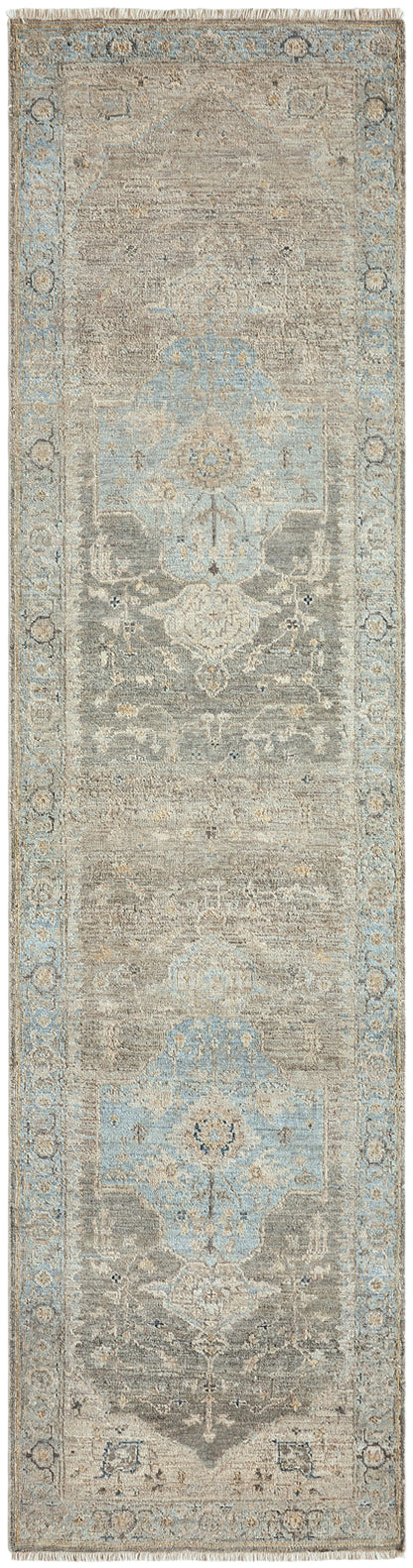 Corner detail, transitional wool rug in gray and blue