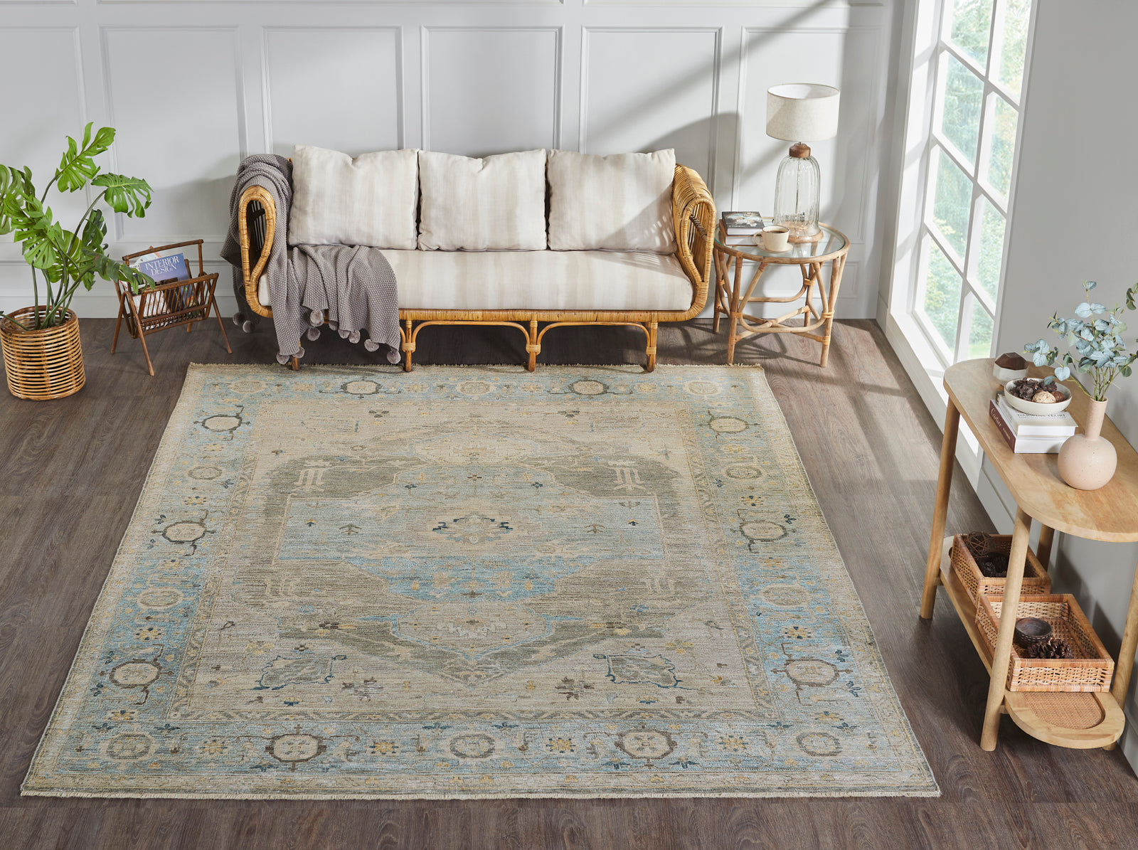 Gray and blue transitional wool rug in room setting