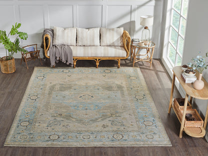 Gray and blue transitional wool rug in room setting