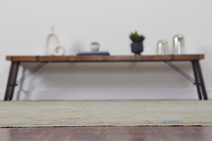 Gray and beige transitional wool rug in room setting
