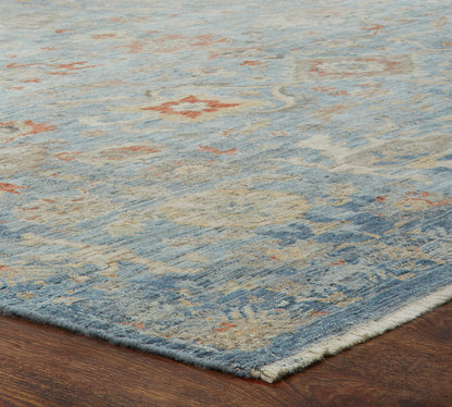 Corner detail, transitional wool rug in blue and gray