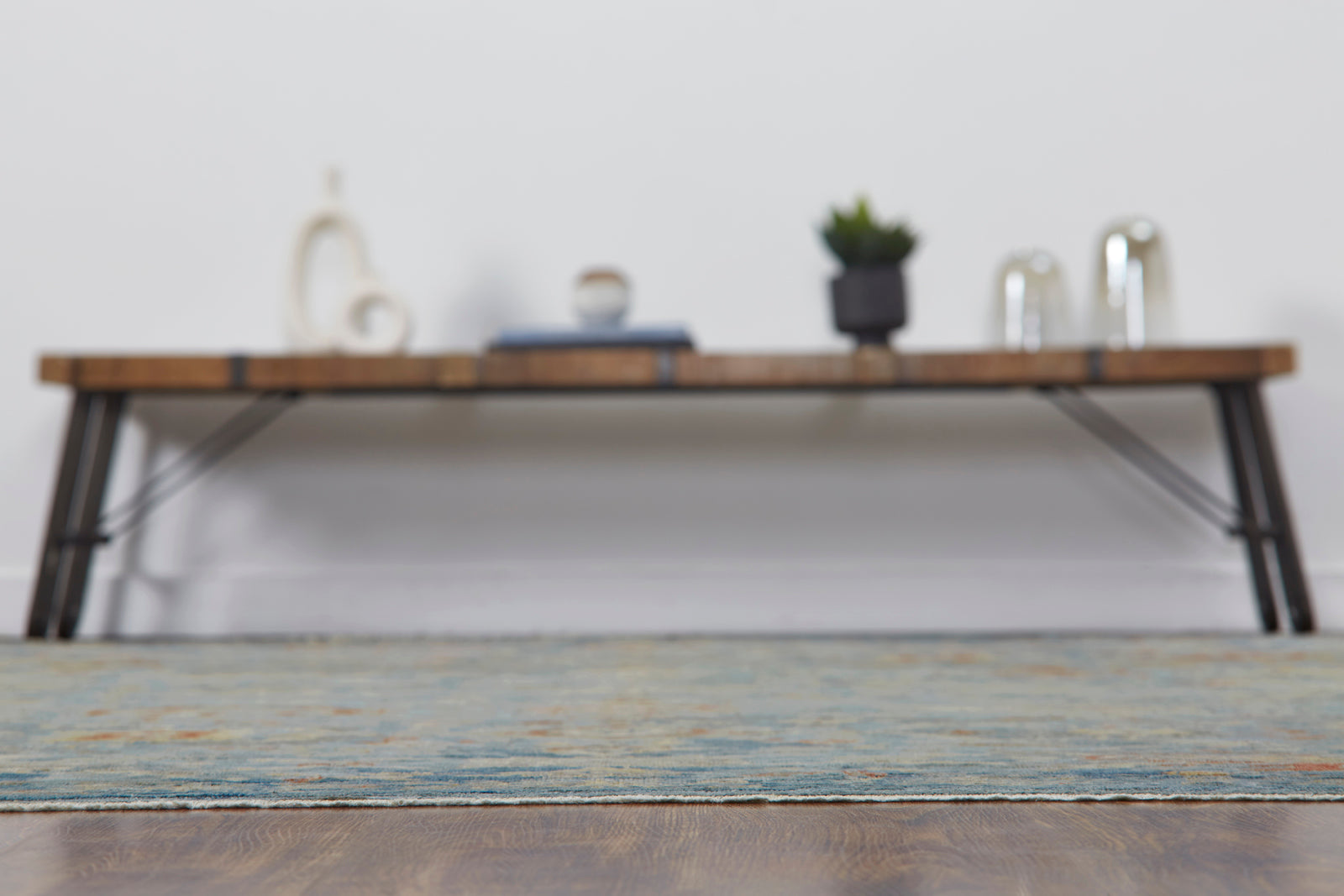 Blue and gray transitional wool rug in room setting