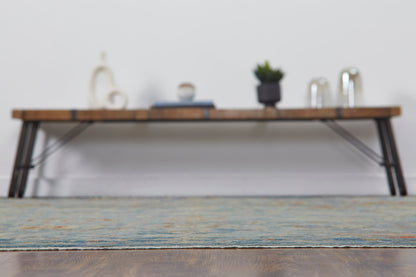 Blue and gray transitional wool rug in room setting