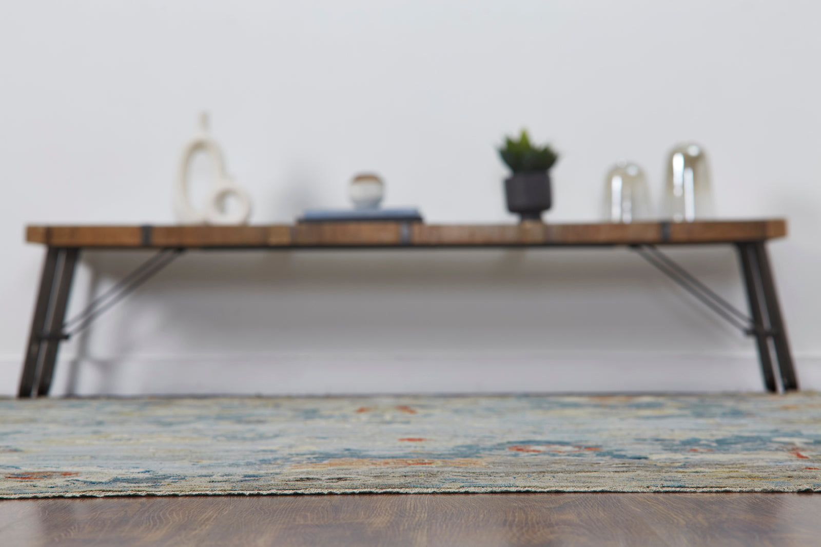 Blue and gray transitional wool rug in room setting