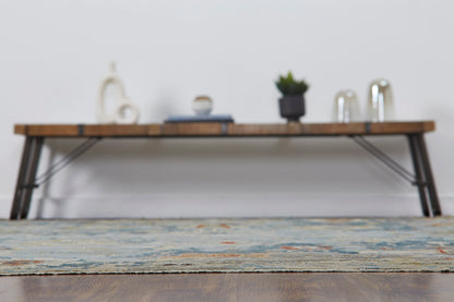 Blue and gray transitional wool rug in room setting