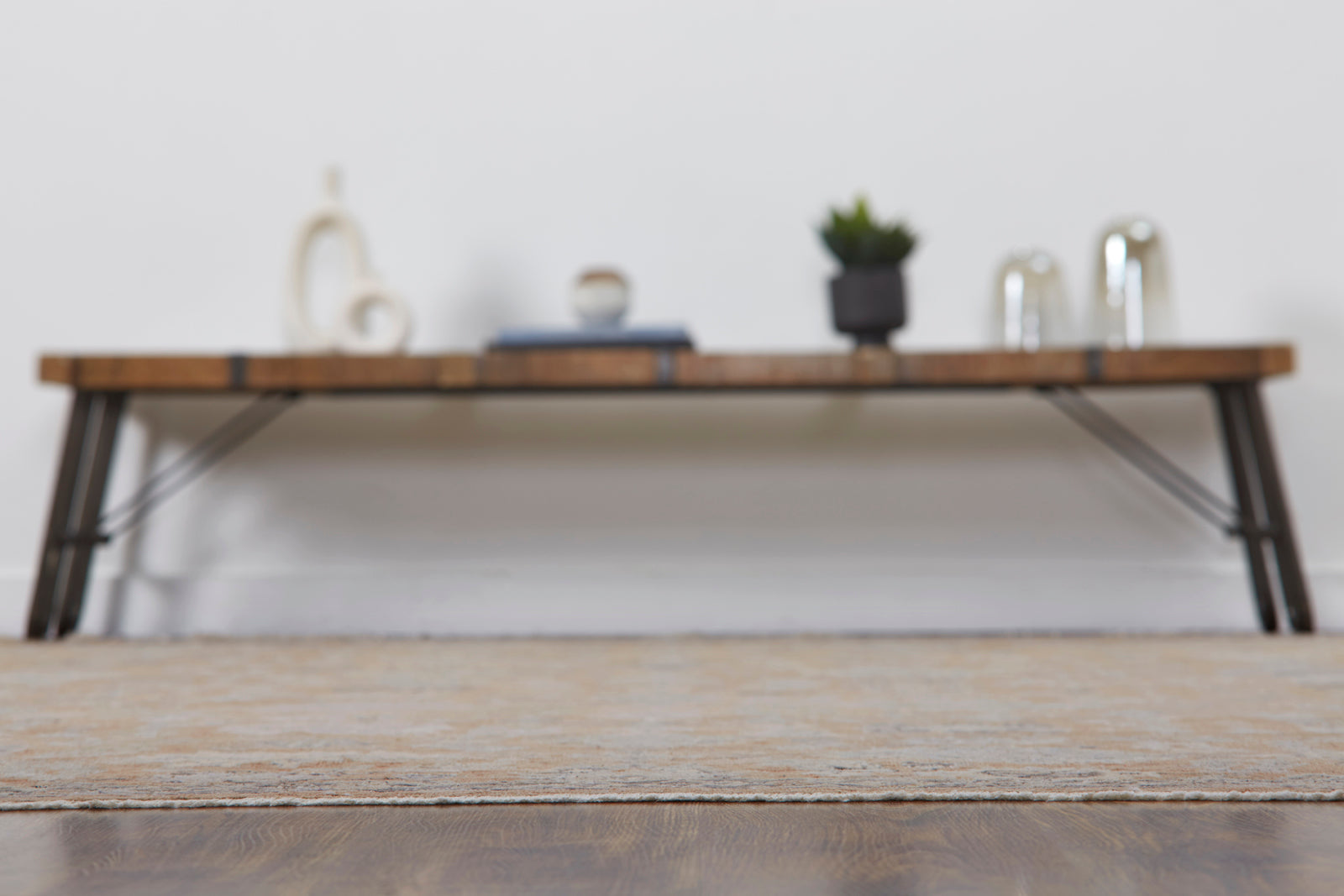 Dusty orange and beige transitional wool rug in room setting
