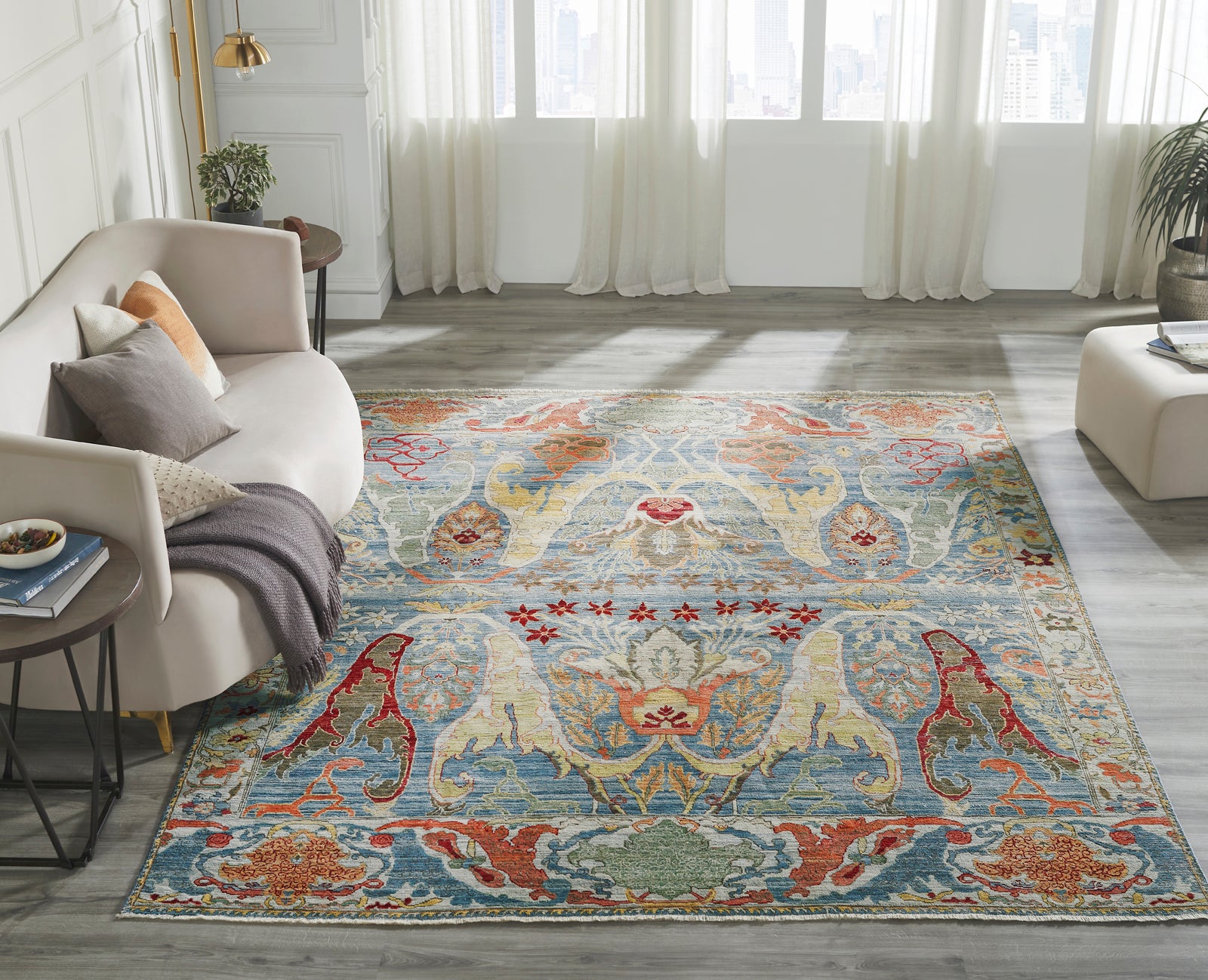 Blue and beige transitional wool rug in room setting