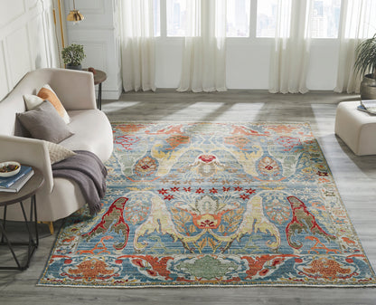 Blue and beige transitional wool rug in room setting