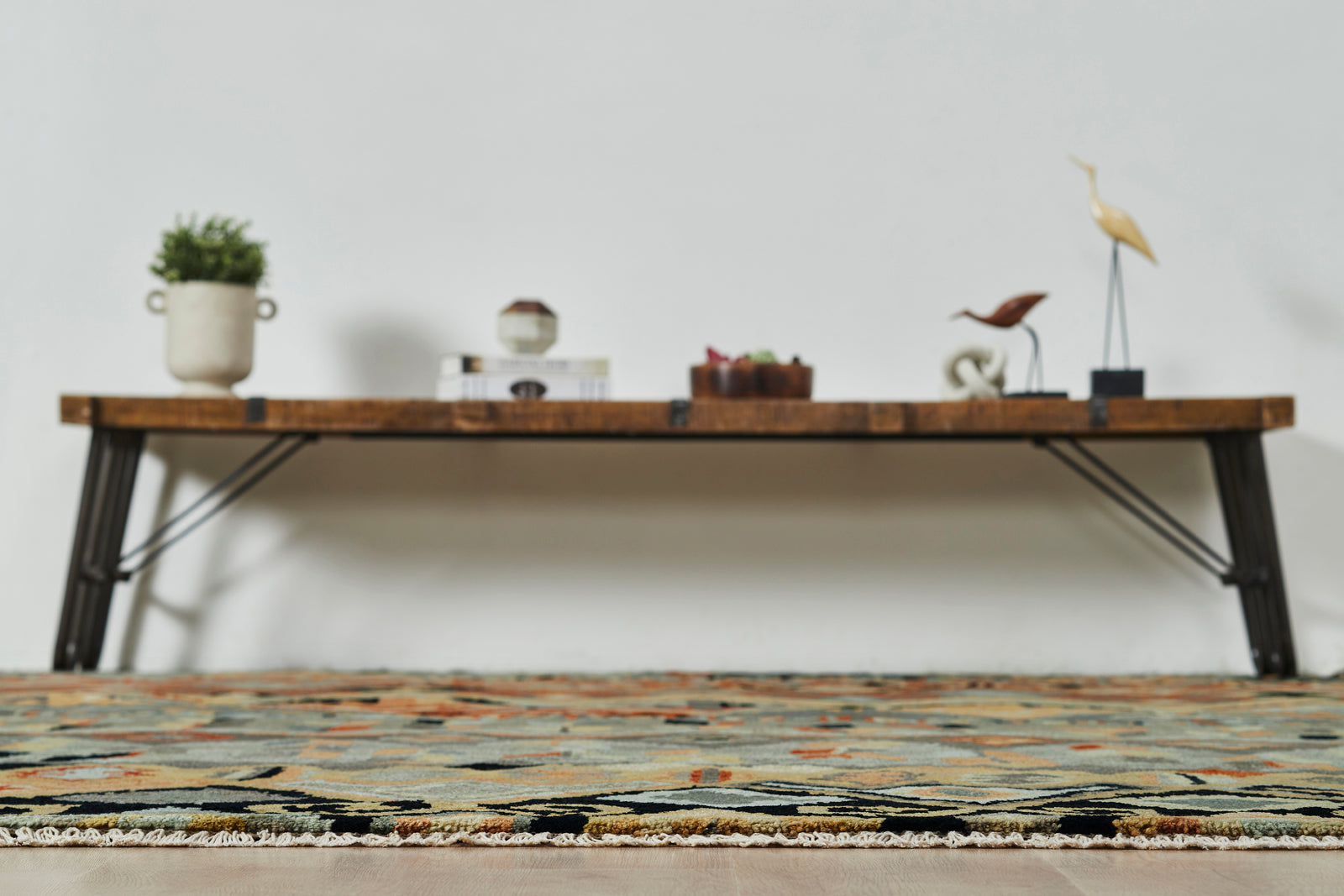 Additional detail view, Ikat wool rug in black and rust
