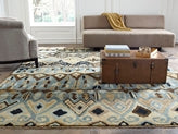 Brown and blue Ikat rug in room setting