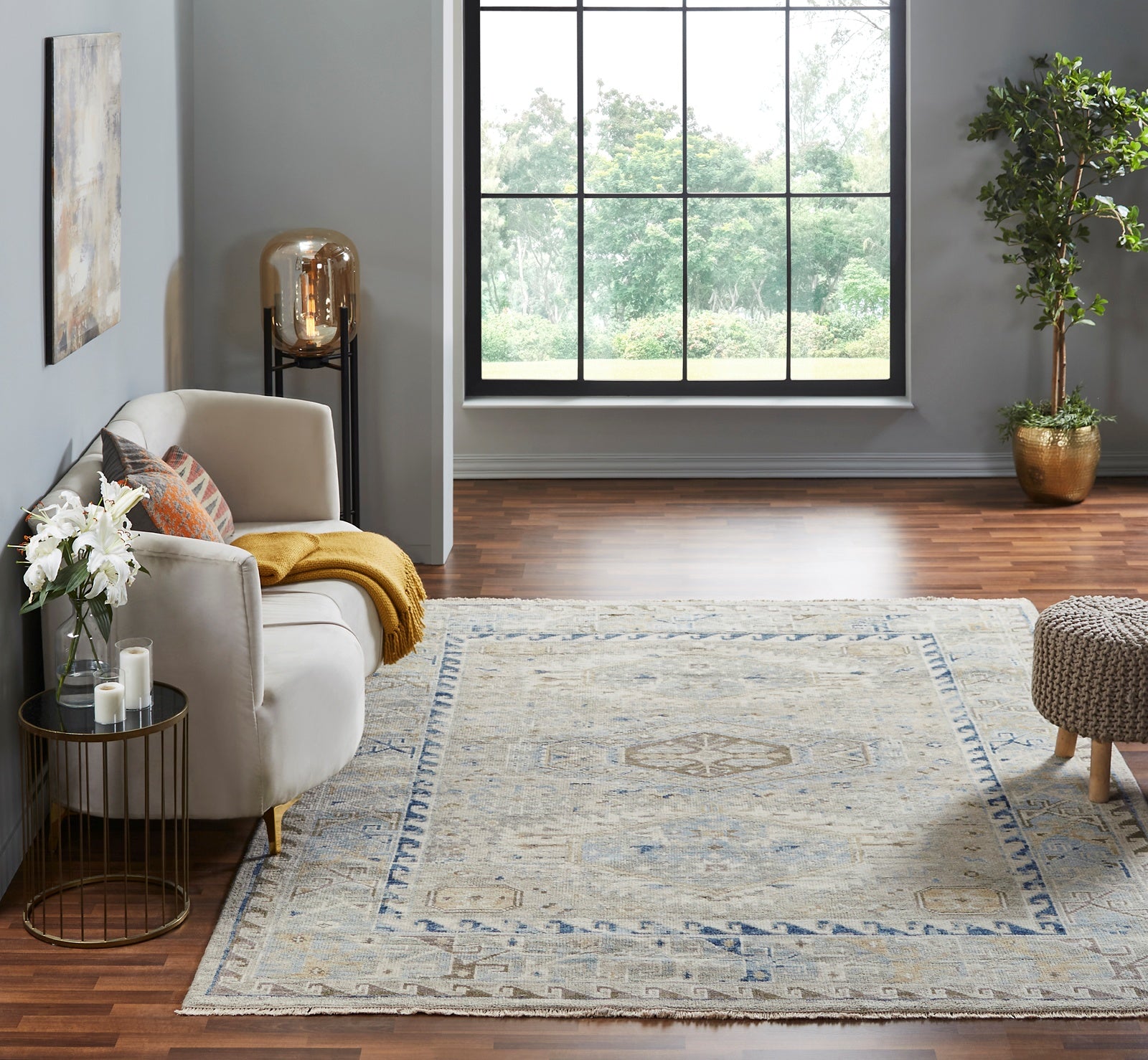 Gray and white Southwest tribal rug in room setting