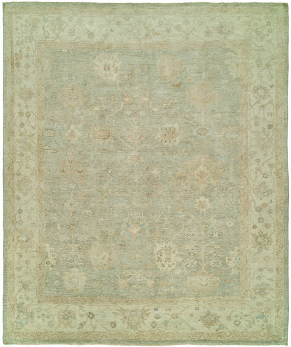 Oushak hand-knotted wool rug in soft green and white, full view