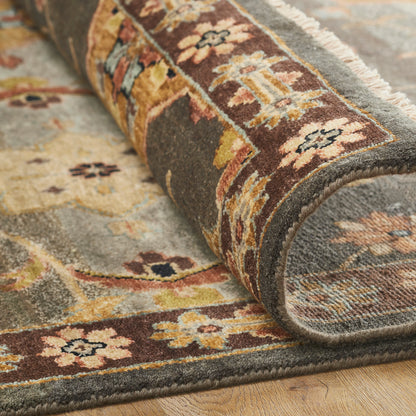 Close-up of wool pile, orange and brown rug