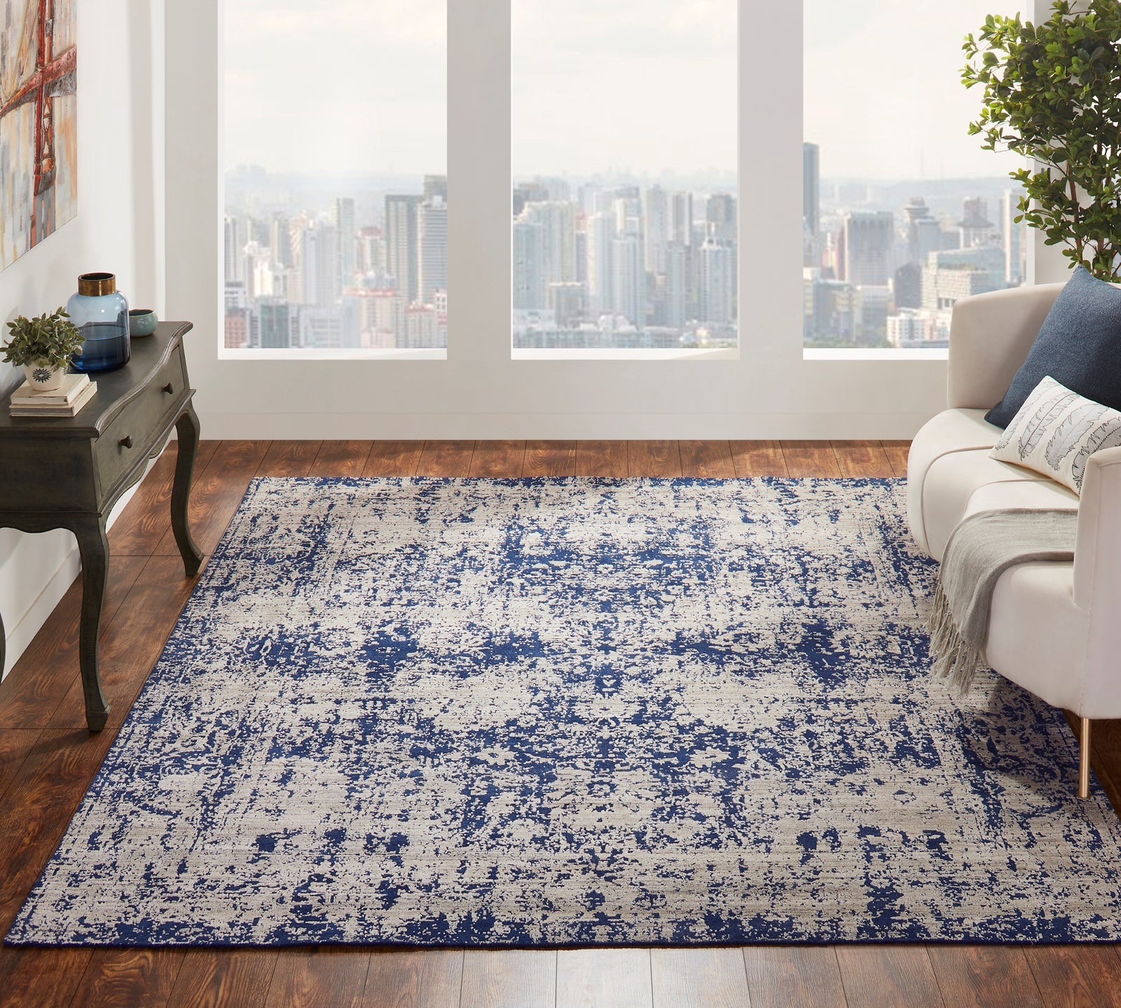 Blue and gray transitional wool-silk rug in room setting